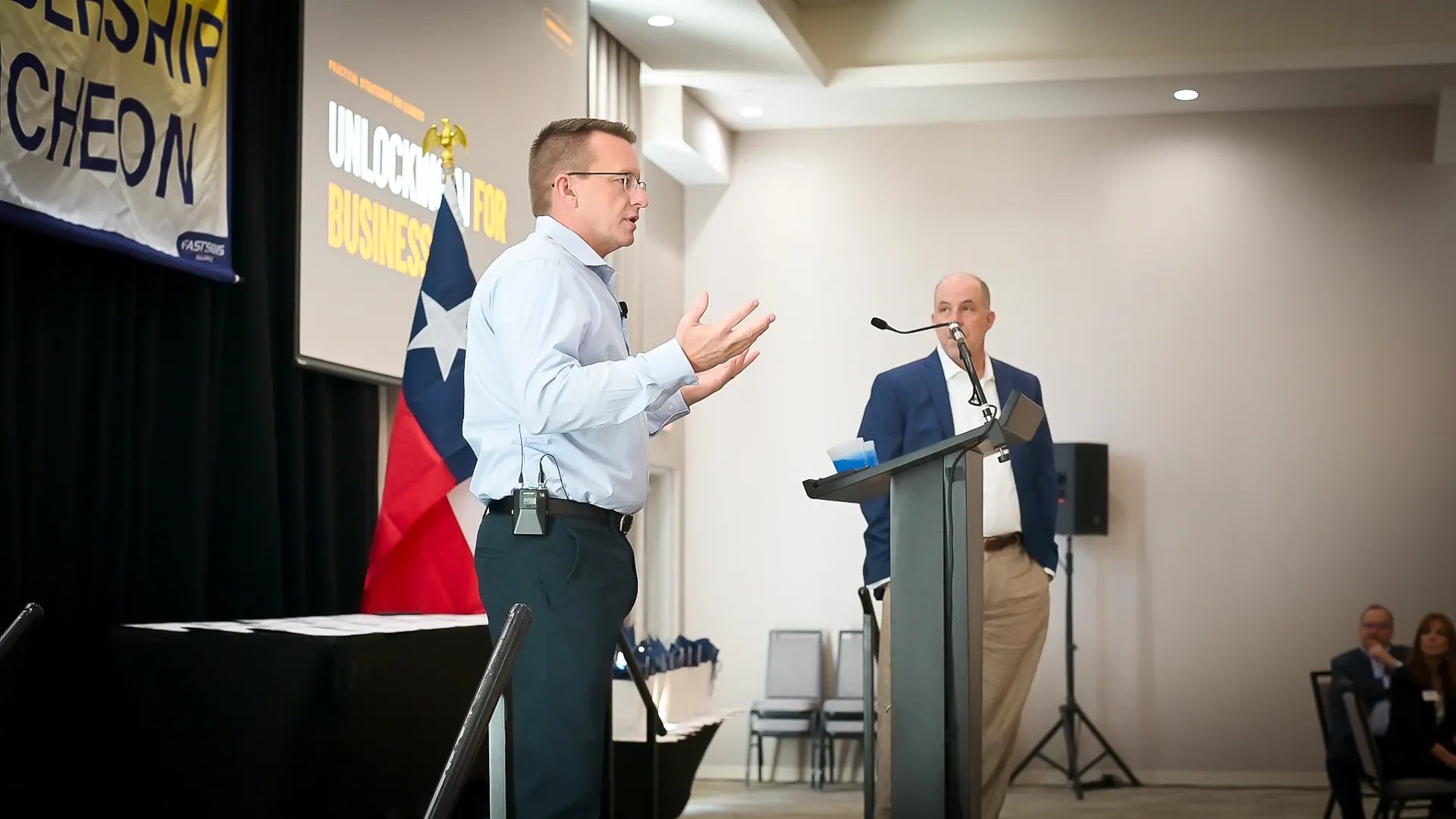 Brian Davis, Founder and President of Aligned Technology Partners, speaking at a Texas leadership luncheon.
